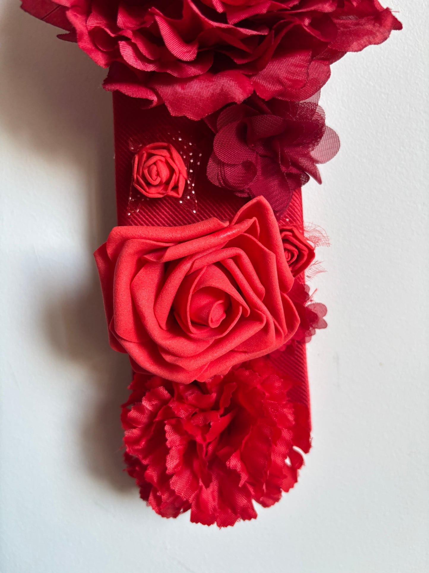 Cravate fleur rouge